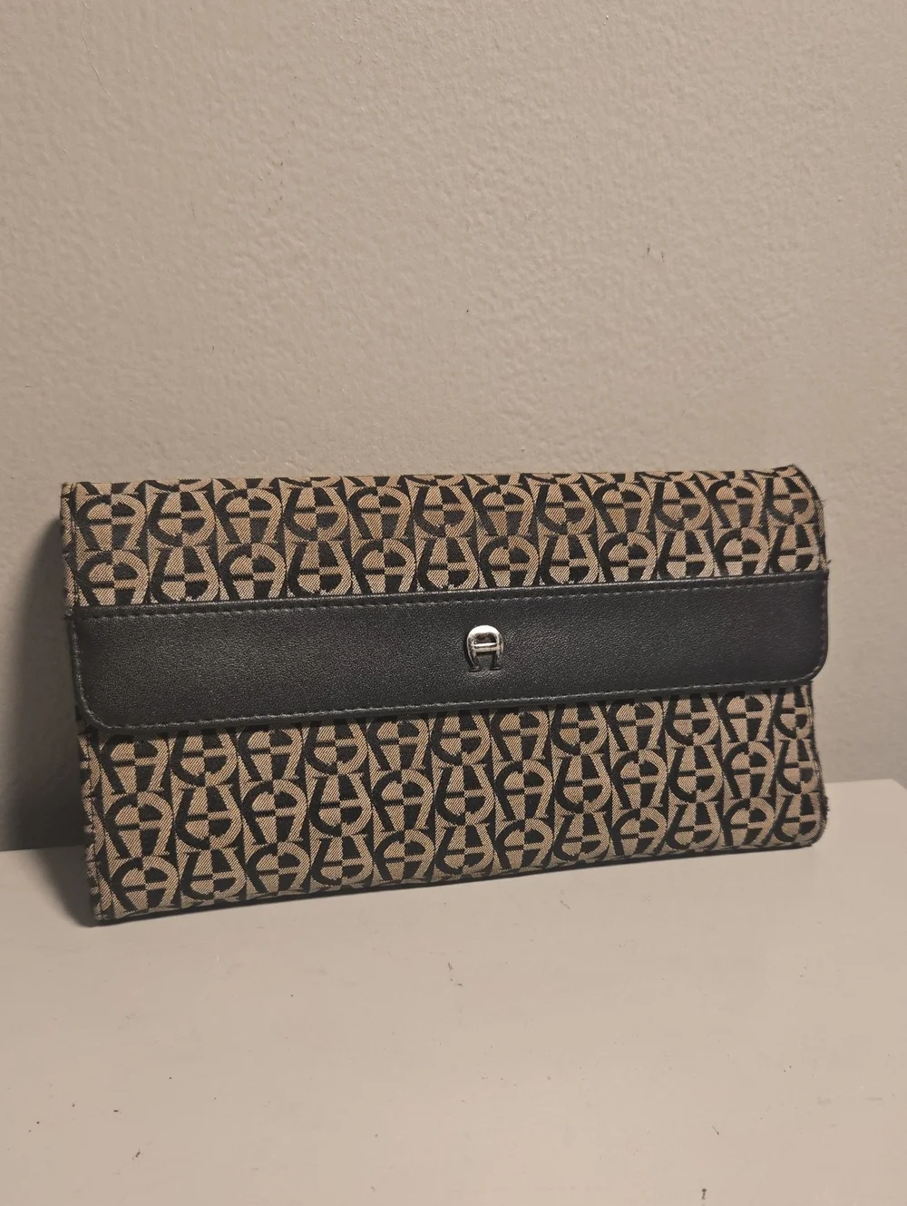 Etienne Aigner Patterned Monogram Clutch in Beige and Black